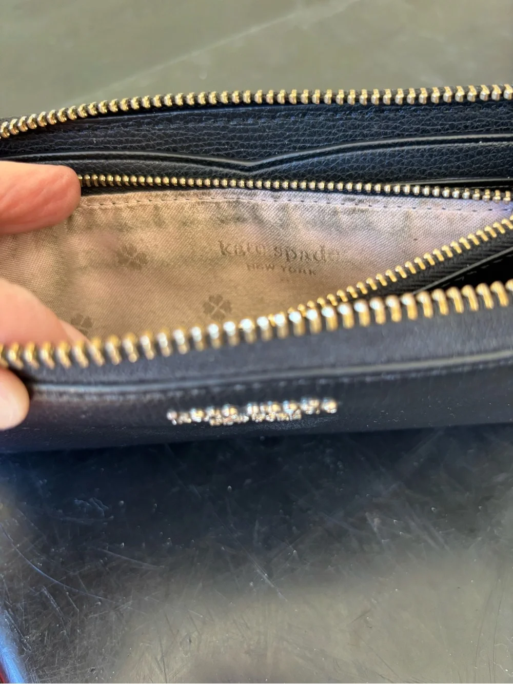 kate spade Black Pebbled Leather Zip Wallet with Gold Logo